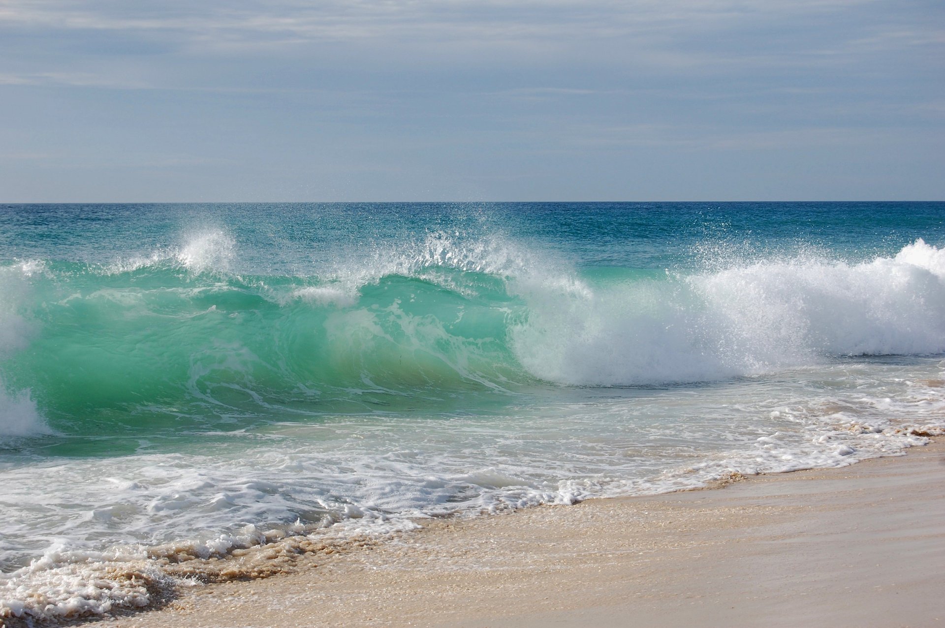 wave waves sea water sand beach shore sky landscape surf ocean horizon