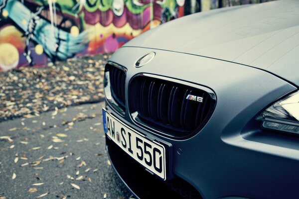 BMW car on the background of graffiti