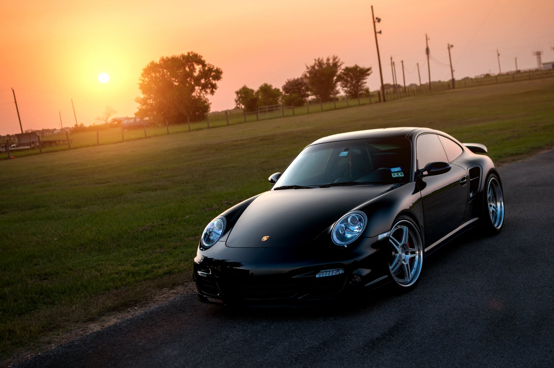 porsche 911 turbo black front porsche sun lawn glare