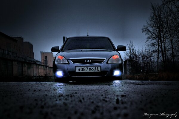 A walk through the night city by Lada Priora car
