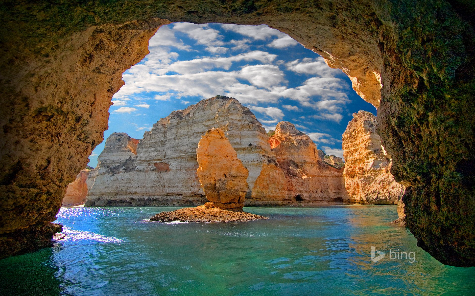 of ponta da piedade lagos portugal sea rock cave grotto arch sky cloud