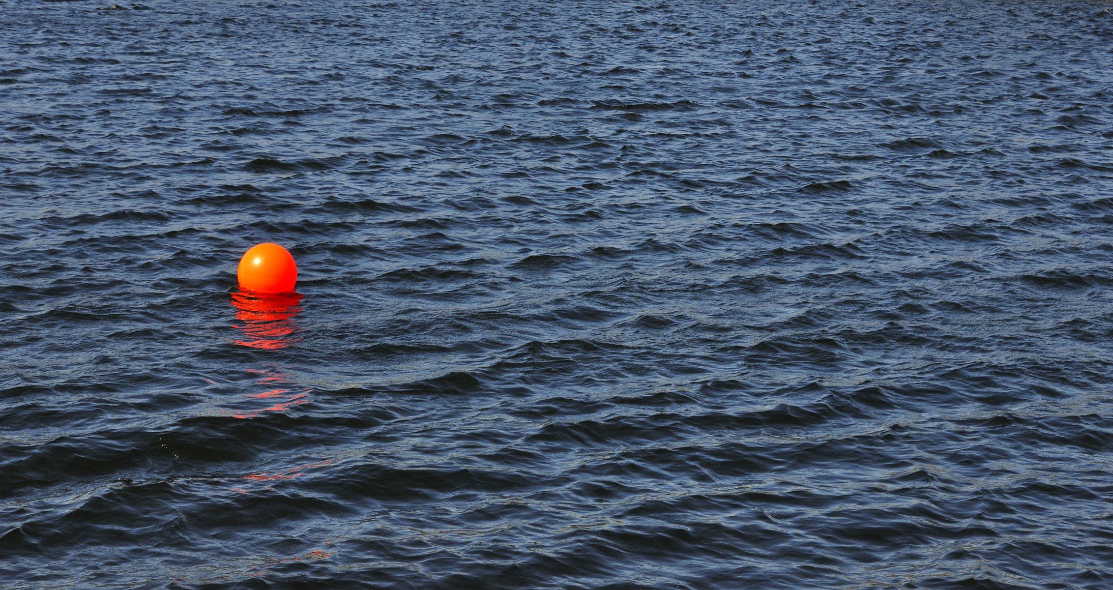 greg stevenson photographer photo water reservoir waves ball red maric float light