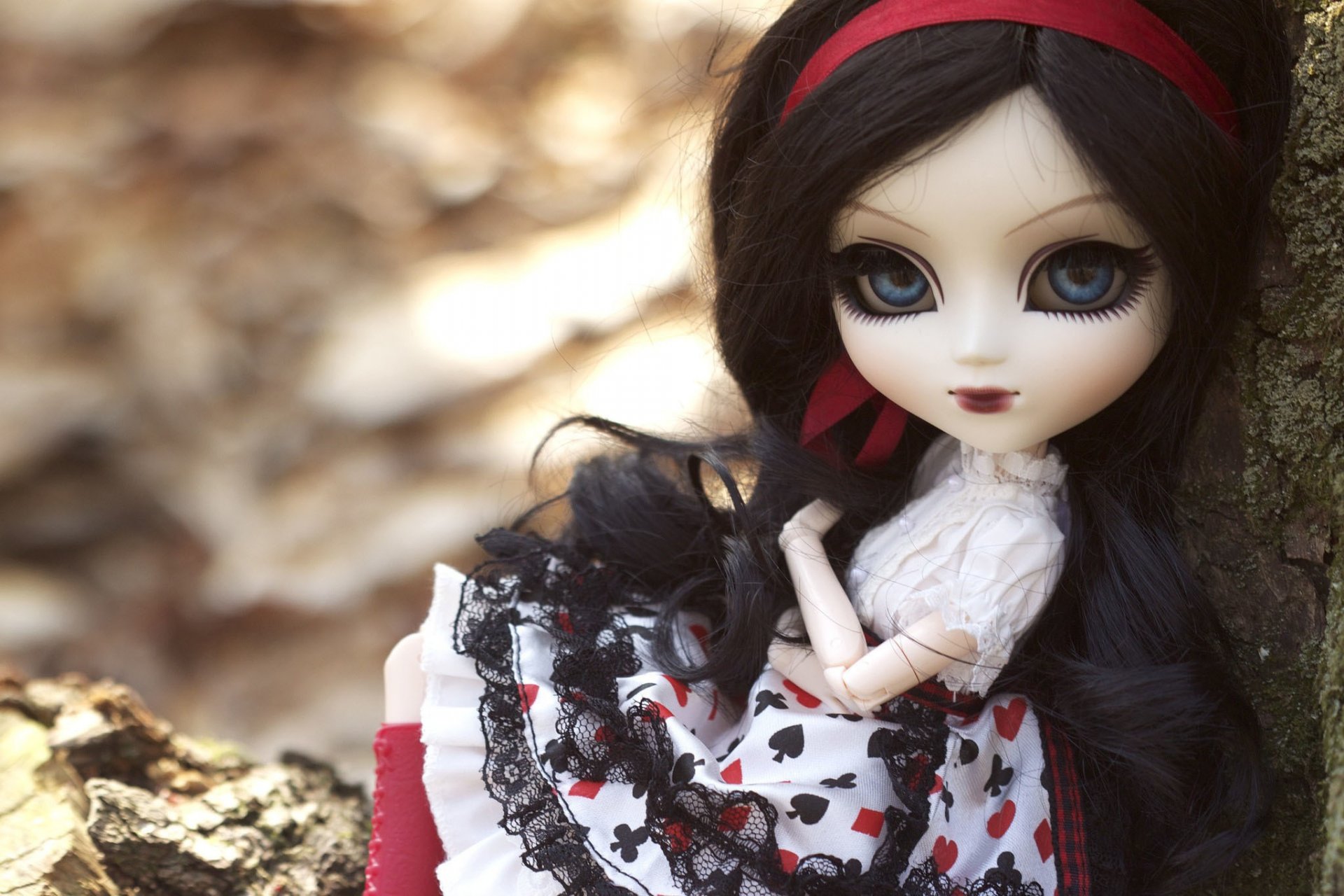 doll toys sitting brunette long hair dress belt