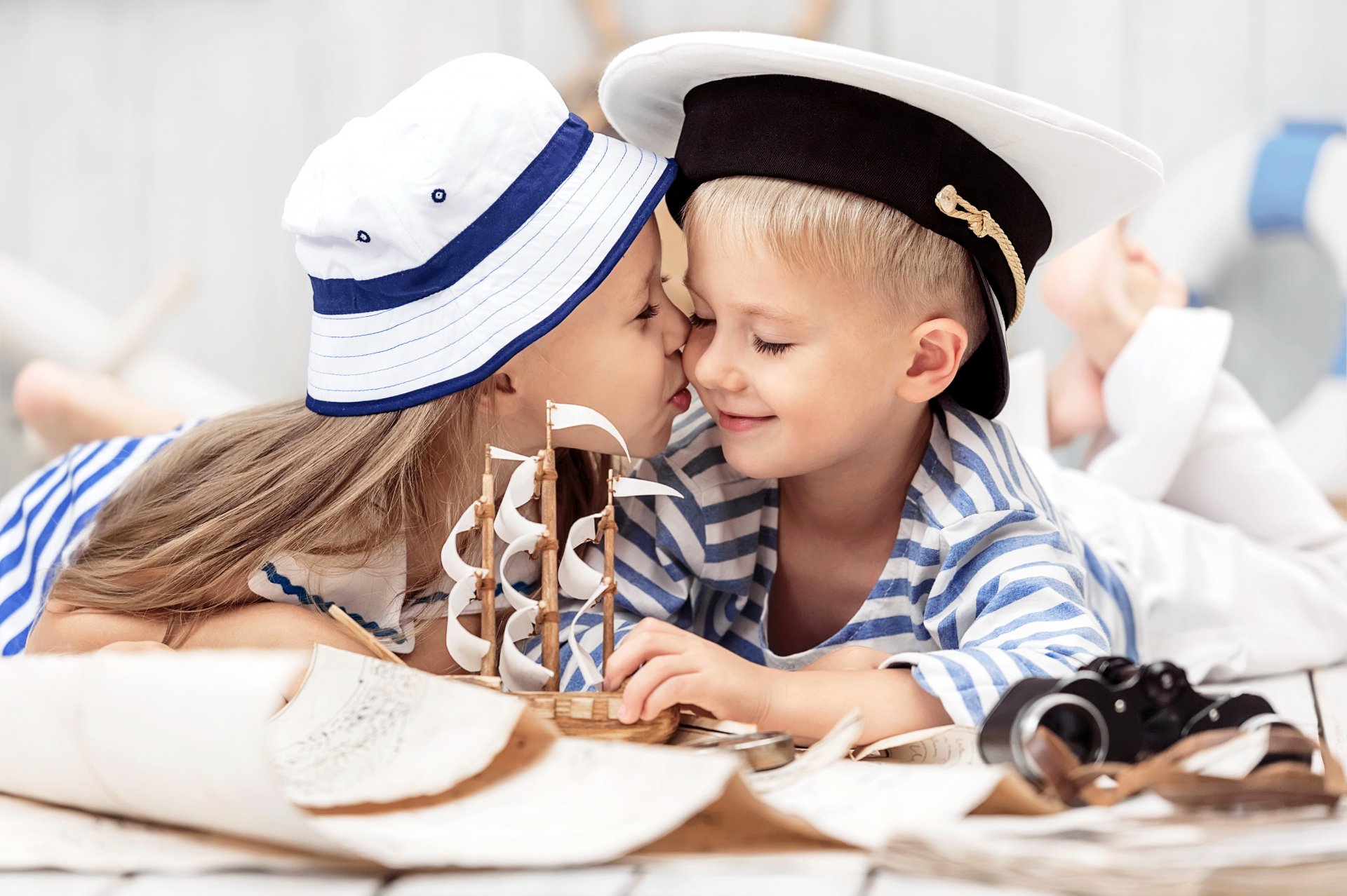 boy girl kiss hat boat kids girl boat friendship