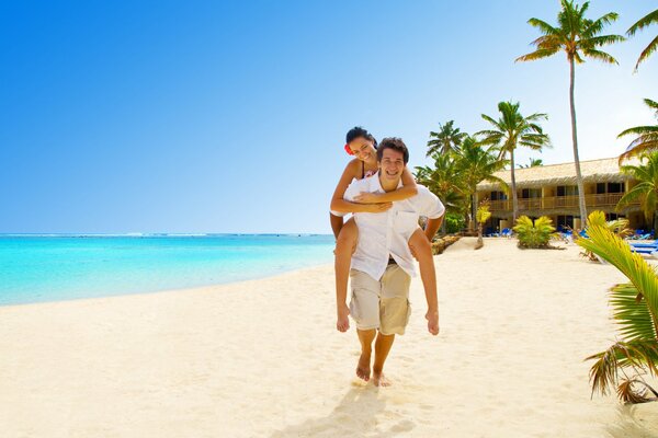 A girl and a guy on the ocean
