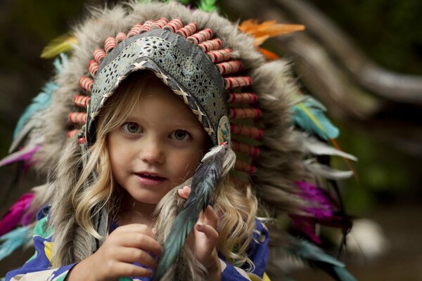 A girl in an Indian headdress