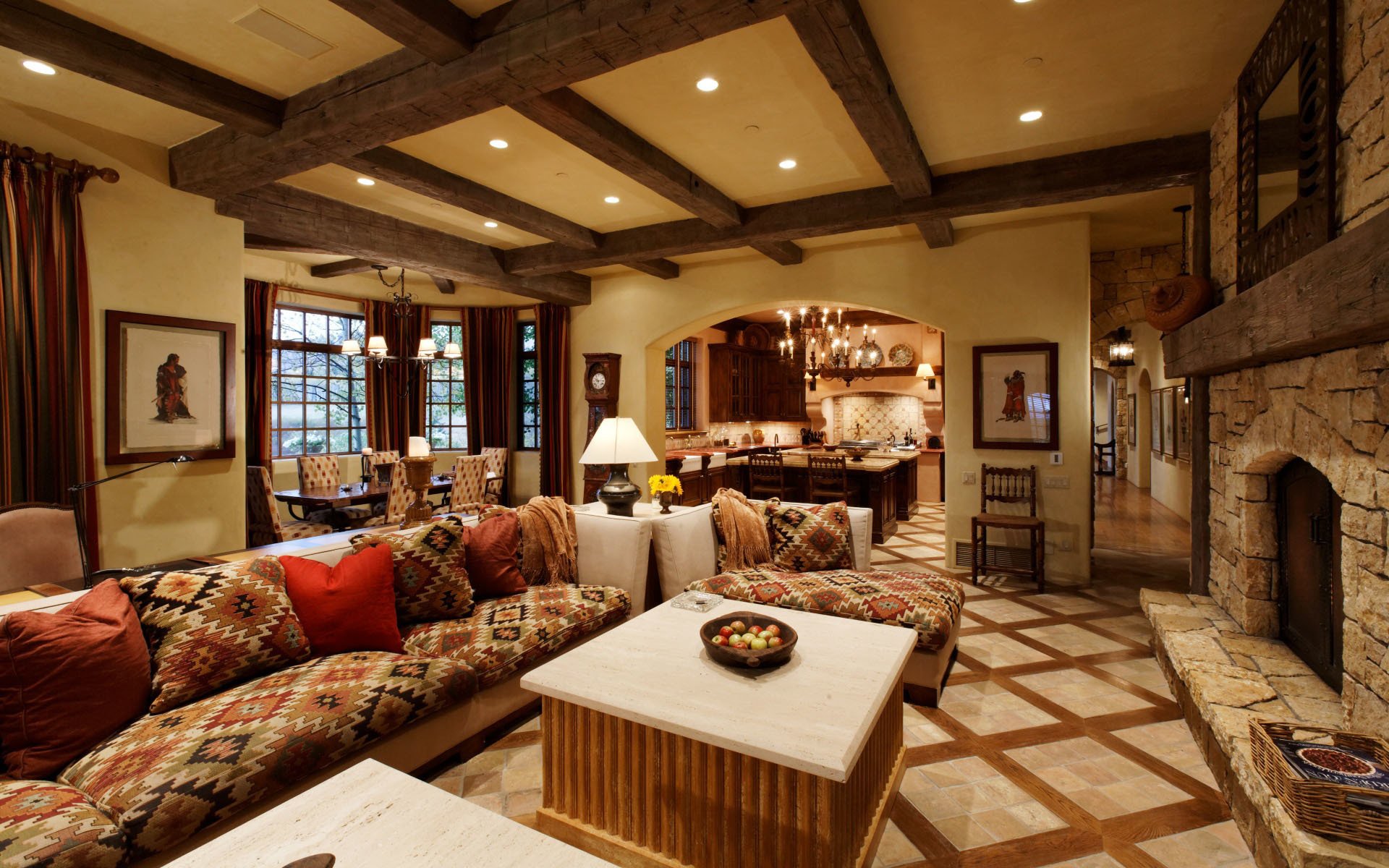 interior living room room kitchen room style fireplace table sofa armchair pillows windows table chair