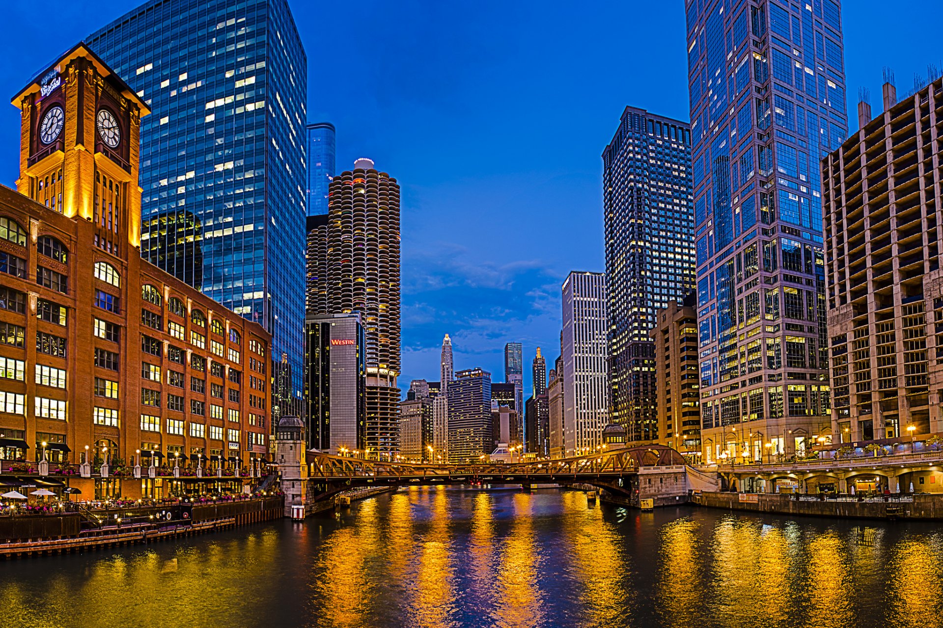 new eastside la salle street bridge chicago illinois usa city evening river bridge skyscrapers buildings clocks houses lighting