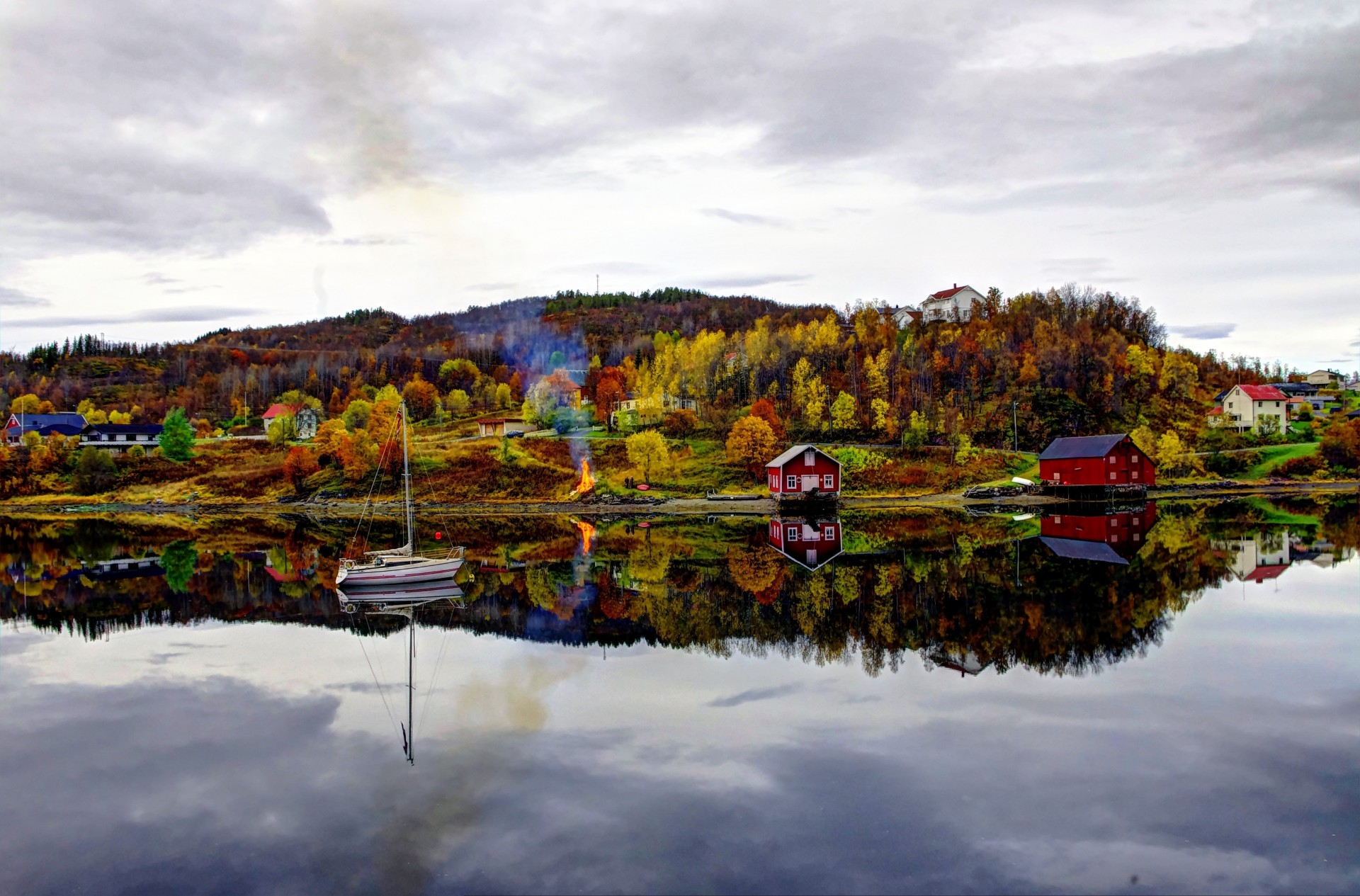 landscape river northern norway autumn boat house
