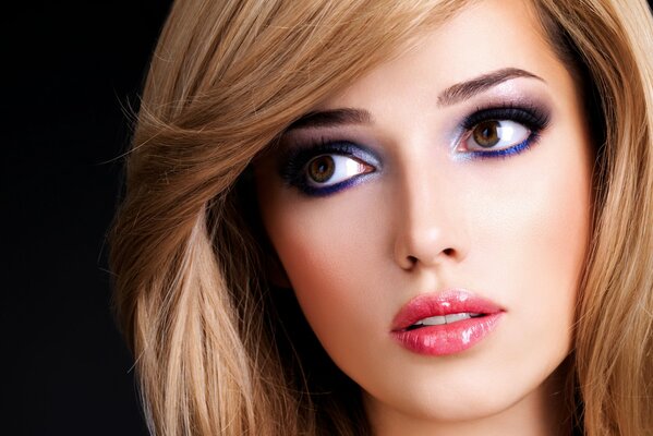 A model with a beautiful hairstyle and makeup