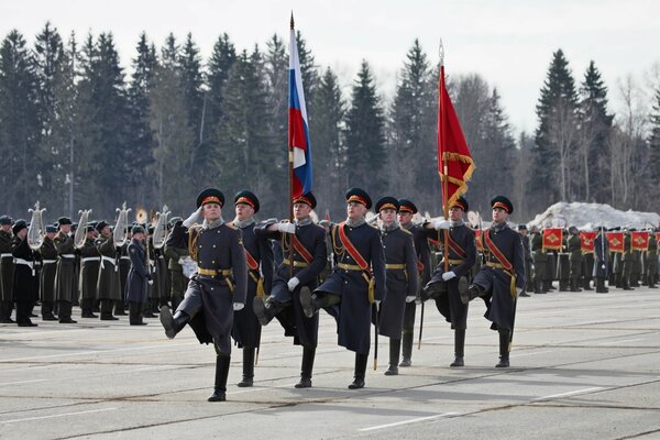 Military on parade give honor