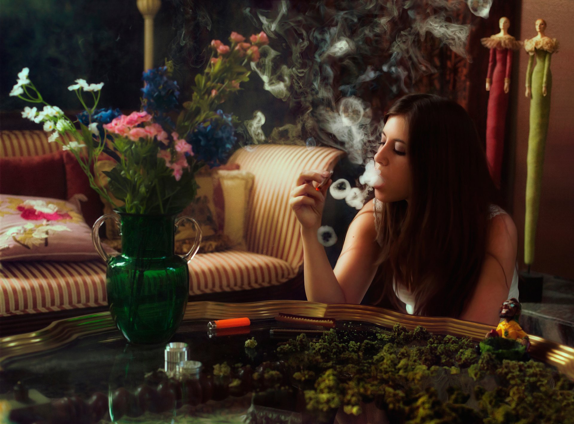 girl smokes joint smoke rings table vase flowers hashish cannabi