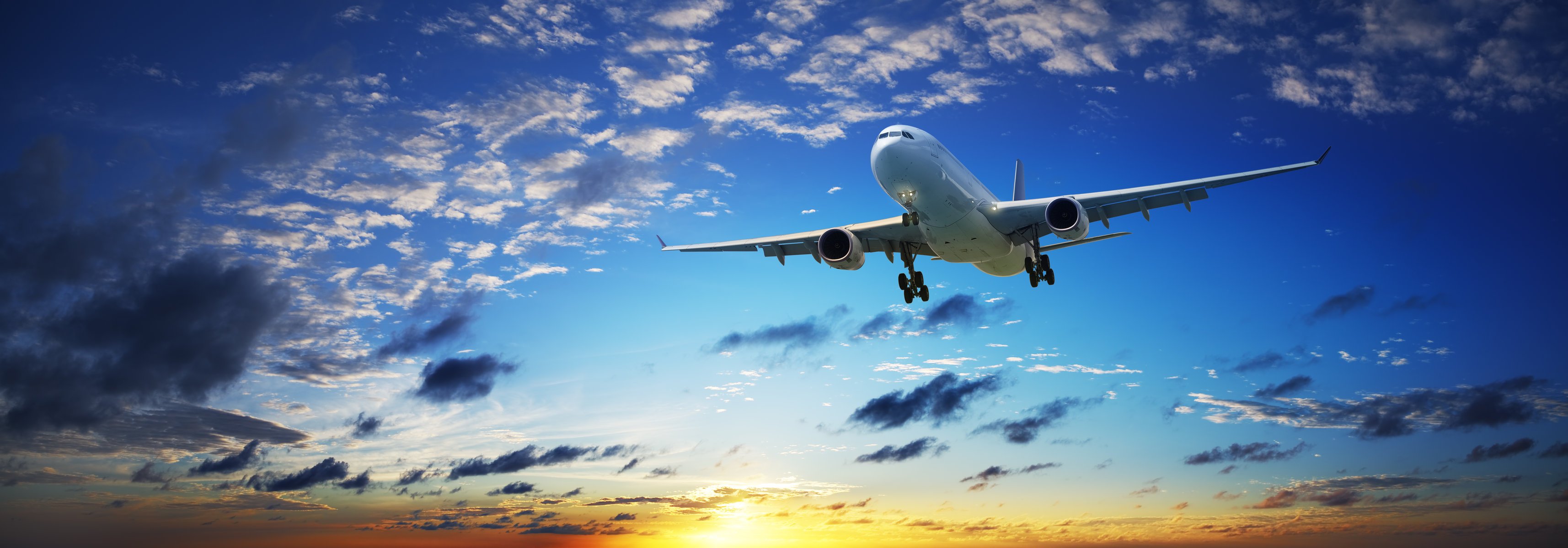 plane liner sky clouds sunset