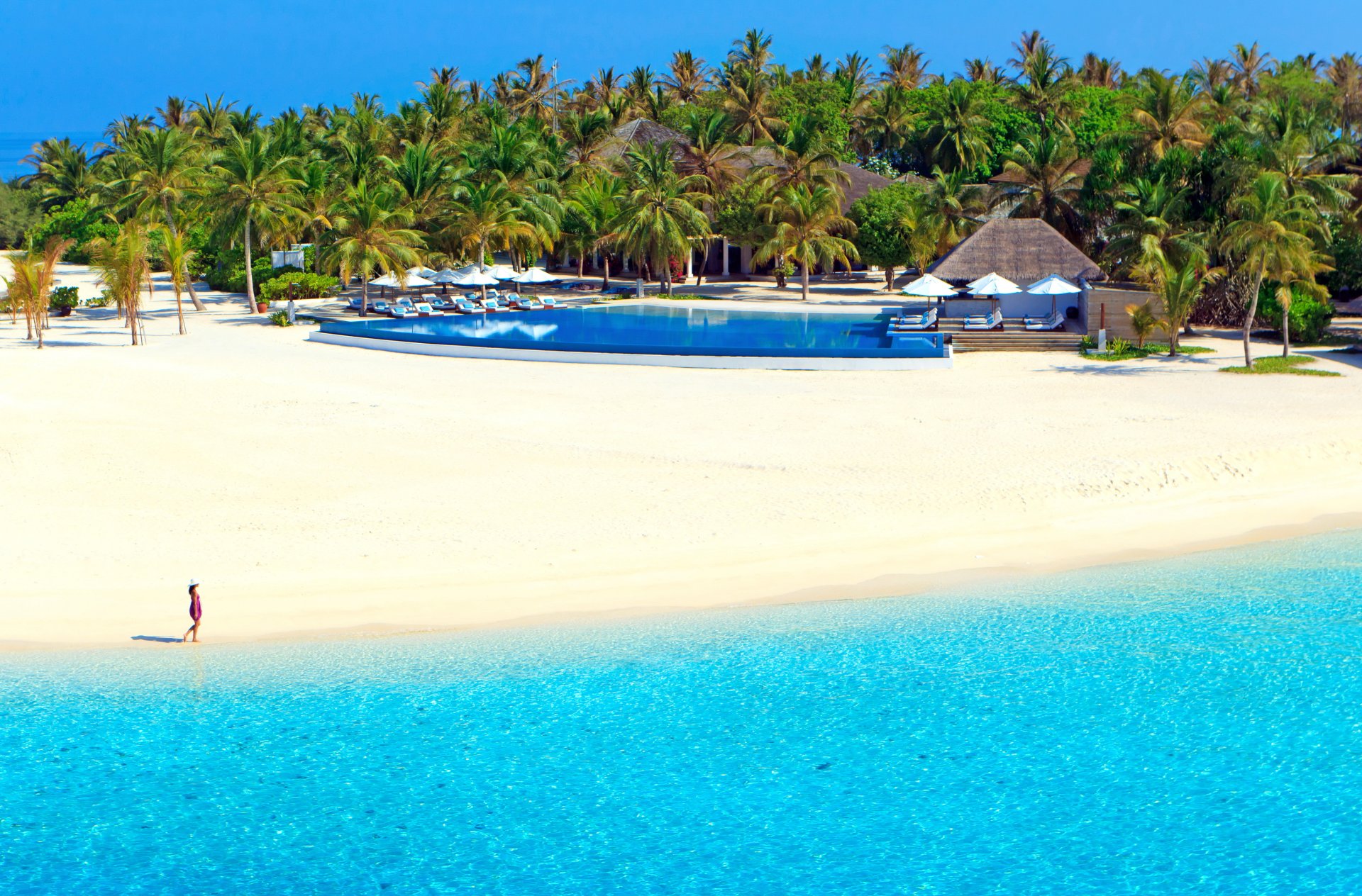 maldives tropics velassaru island resort vacation sea sun shore beach sand palm trees pool sun lounger