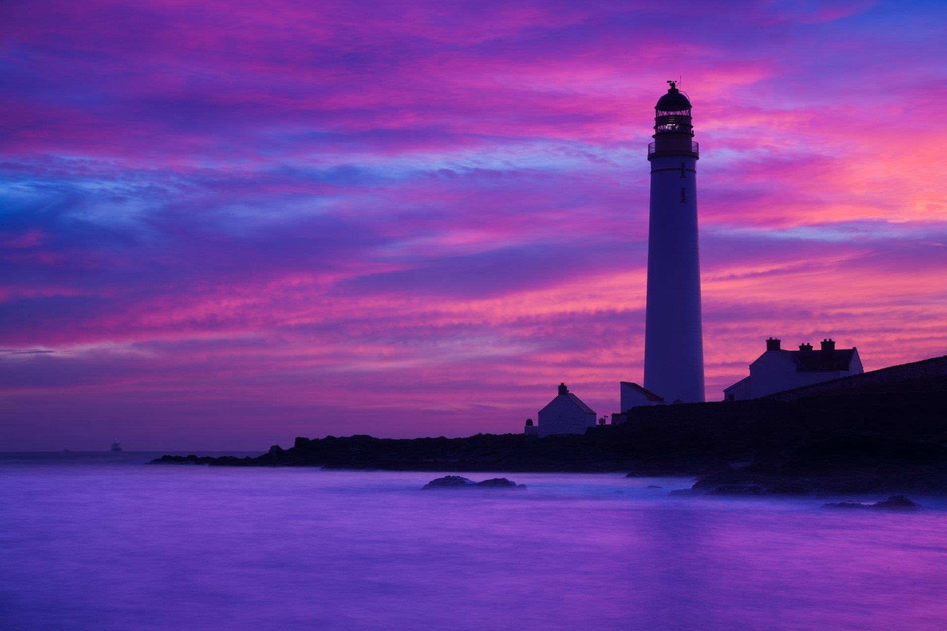 lighthouse rasvet twilight ocean stones rock