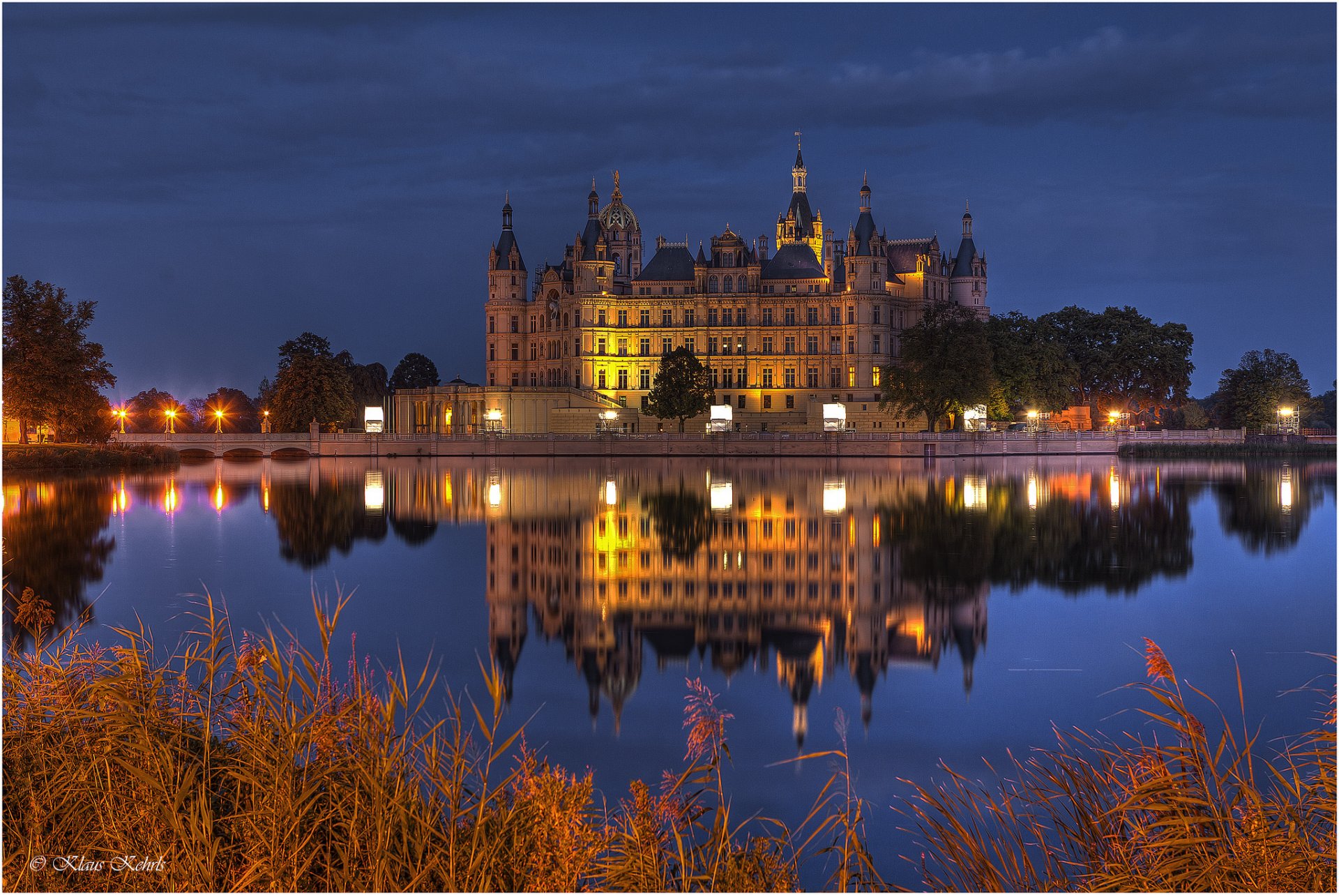 germany schwerin castle lights lighting lake night blue sky reflection