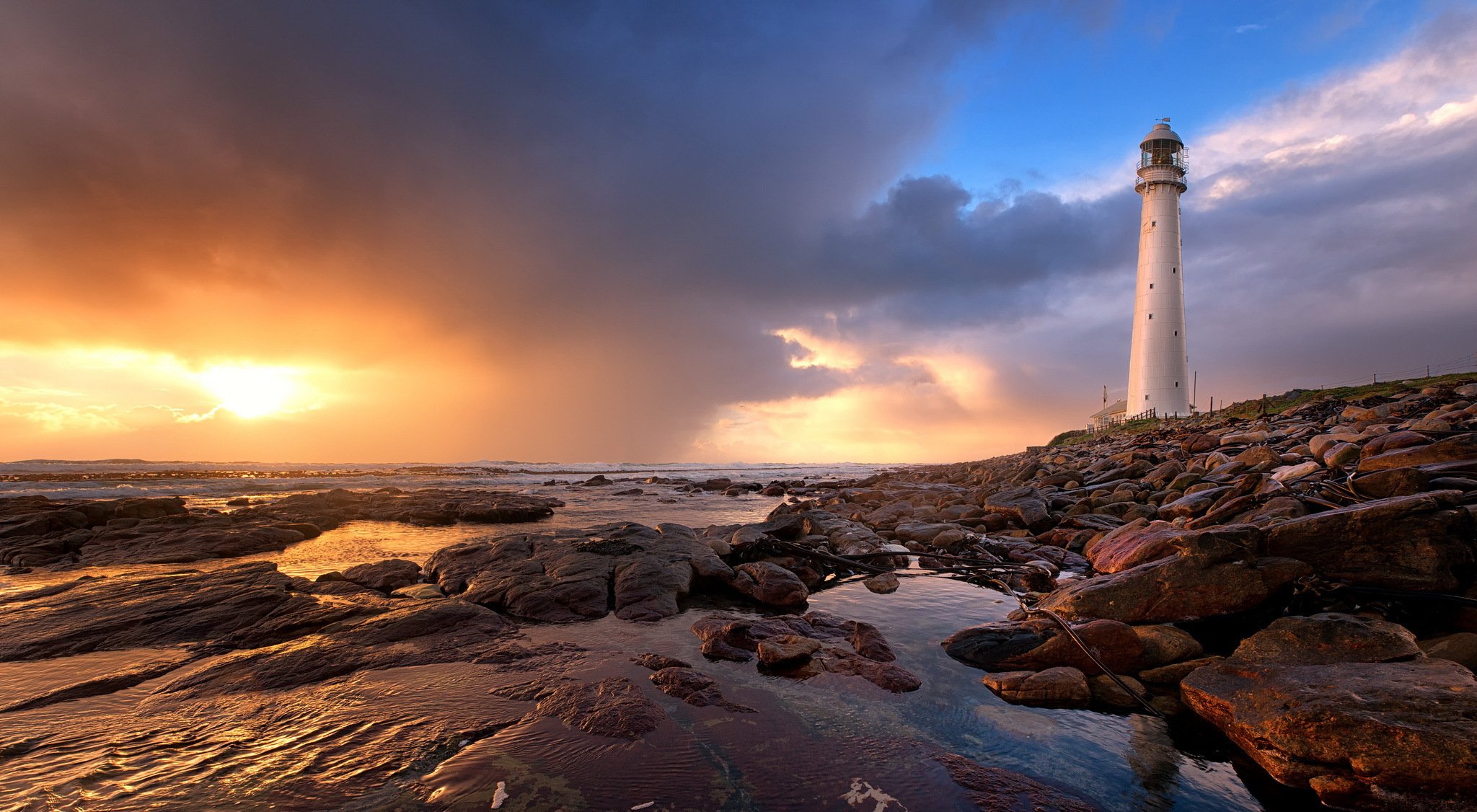 ea beach lighthouse sunset